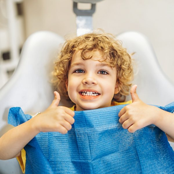Happy,Cute,Little,Boy,In,Dental,Ofiice,Showing,Thumbs,Up