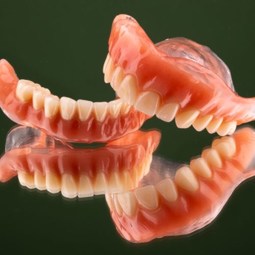 Focus,On,Maxillary,And,Mandibular,Complete,Dentures